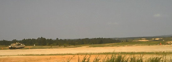 GUNS!!!!. /missiles.. I guess no one else noticed the one gif is reversed, giving the guy in the helicopter a magic puti-together gun.