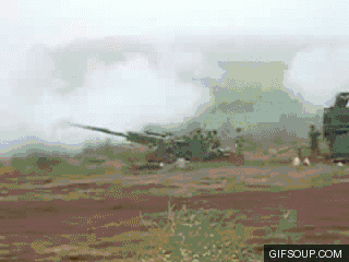 GUNS!!!!. /missiles.. I guess no one else noticed the one gif is reversed, giving the guy in the helicopter a magic puti-together gun.