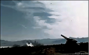 GUNS!!!!. /missiles.. I guess no one else noticed the one gif is reversed, giving the guy in the helicopter a magic puti-together gun.