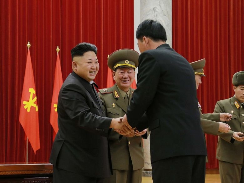 Glorious Admin Comp. Admin making fun of OP with all of his buff handsome friends. Admin delivers a New Year address in Pyongyang on Jan. 1 in this photo releas