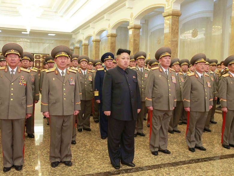 Glorious Admin Comp. Admin making fun of OP with all of his buff handsome friends. Admin delivers a New Year address in Pyongyang on Jan. 1 in this photo releas