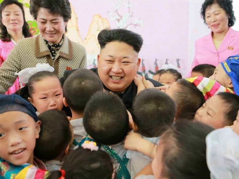 Glorious Admin Comp. Admin making fun of OP with all of his buff handsome friends. Admin delivers a New Year address in Pyongyang on Jan. 1 in this photo releas