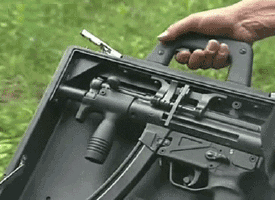 GUNS!!!!. /missiles.. I guess no one else noticed the one gif is reversed, giving the guy in the helicopter a magic puti-together gun.